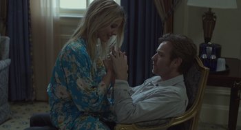 Movie still from “Beginners” (2010), directed by Mike Mills – A man and a woman holding hands in a room; Medium shot, Over the shoulder angle