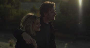 Movie still from “Beginners” (2010), directed by Mike Mills – A man and a woman standing next to each other; Close Up shot, Low angle