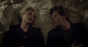 Movie still from “Beginners” (2010), directed by Mike Mills – A man and a woman laying in bed next to each other; Close Up shot, Overhead angle