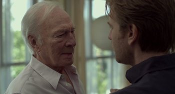 Movie still from “Beginners” (2010), directed by Mike Mills – A man and an older man talking to each other; Close Up shot, Over the shoulder angle