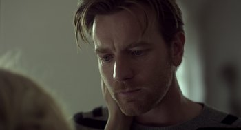 Movie still from “Beginners” (2010), directed by Mike Mills – A person looking at the camera; Close Up shot, Over the shoulder angle