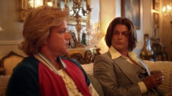 Movie still from “Behind the Candelabra” (2013), directed by Steven Soderbergh – Two men sitting next to each other in front of a mirror; Medium shot, Over the shoulder angle