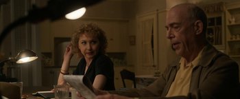 Movie still from “Being the Ricardos” (2021), directed by Aaron Sorkin – Two people sitting at a table in a room; Medium shot, Over the shoulder angle