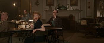 Movie still from “Being the Ricardos” (2021), directed by Aaron Sorkin – A man and a woman sitting at a dinner table; Medium shot, Low angle