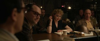 Movie still from “Being the Ricardos” (2021), directed by Aaron Sorkin – A woman sitting at a table writing on a notebook; Medium shot, Over the shoulder angle