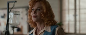 Movie still from “Being the Ricardos” (2021), directed by Aaron Sorkin – A person with long red hair; Close Up shot, Over the shoulder angle