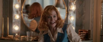 Movie still from “Being the Ricardos” (2021), directed by Aaron Sorkin – A woman sitting in front of a mirror in a room; Medium shot, Over the shoulder angle