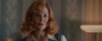 Movie still from “Being the Ricardos” (2021), directed by Aaron Sorkin – A person with red hair; Close Up shot, Over the shoulder angle