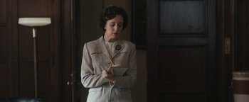 Movie still from “Being the Ricardos” (2021), directed by Aaron Sorkin – An older woman is holding a bowl of food; Medium shot, Low angle