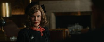 Movie still from “Being the Ricardos” (2021), directed by Aaron Sorkin – A person wearing a dress; Close Up shot, Over the shoulder angle