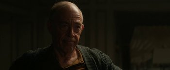 Movie still from “Being the Ricardos” (2021), directed by Aaron Sorkin – An older man with a beard and a sweater; Close Up shot, Over the shoulder angle