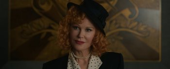 Movie still from “Being the Ricardos” (2021), directed by Aaron Sorkin – A person wearing a suit and hat; Close Up shot, Low angle