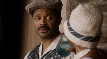 Movie still from “Bessie” (2015), directed by Dee Rees – A man and a woman are standing next to each other; Close Up shot, Over the shoulder angle