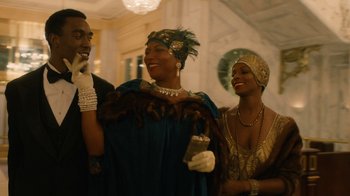 Movie still from “Bessie” (2015), directed by Dee Rees – A group of people standing next to each other in costume; Medium shot, Low angle
