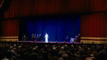 Movie still from “Bessie” (2015), directed by Dee Rees – A crowd of people watching a performance on stage; Extreme Wide shot, High angle