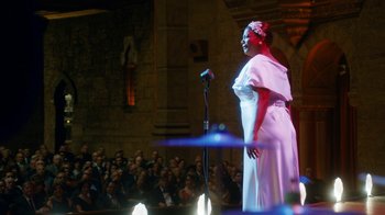 Movie still from “Bessie” (2015), directed by Dee Rees – A woman standing on a stage in front of a crowd; Wide shot, Over the shoulder angle