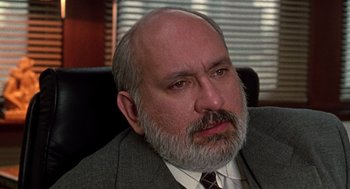 Movie still from “Best in Show” (2000), directed by Christopher Guest – An older man wearing a suit and a tie; Close Up shot, Low angle