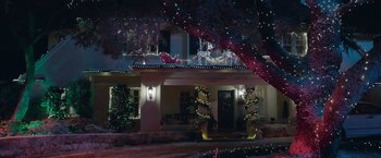 Movie still from “Better Watch Out” (2016), directed by Chris Peckover – A house decorated for the christmas holidays with lights; Extreme Wide shot, Low angle
