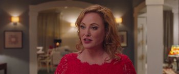 Movie still from “Better Watch Out” (2016), directed by Chris Peckover – A person wearing a red dress; Close Up shot, Over the shoulder angle