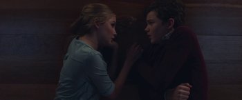 Movie still from “Better Watch Out” (2016), directed by Chris Peckover – A young man and a young woman looking at each other; Medium shot, Overhead angle