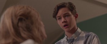 Movie still from “Better Watch Out” (2016), directed by Chris Peckover – A young man talking to another young man; Close Up shot, Over the shoulder angle