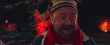 Movie still from “Better Watch Out” (2016), directed by Chris Peckover – A person wearing a hat and a scarf; Close Up shot, Over the shoulder angle