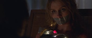 Movie still from “Better Watch Out” (2016), directed by Chris Peckover – A woman with duct tape around her mouth; Close Up shot, Low angle