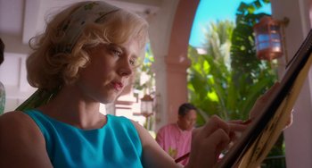 Movie still from “Big Eyes” (2014), directed by Tim Burton – A woman in a blue dress looking at a computer screen; Close Up shot, Low angle