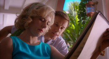 Movie still from “Big Eyes” (2014), directed by Tim Burton – A man and a woman looking at something in a mirror; Close Up shot, Low angle