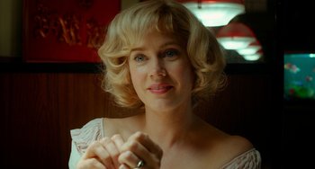 Movie still from “Big Eyes” (2014), directed by Tim Burton – A person with a ring; Close Up shot, Over the shoulder angle