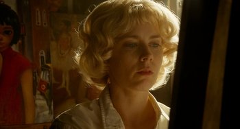 Movie still from “Big Eyes” (2014), directed by Tim Burton – A woman with blonde hair looking at a mirror; Close Up shot, Low angle
