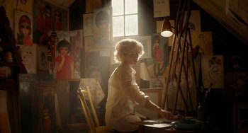 Movie still from “Big Eyes” (2014), directed by Tim Burton – A woman sitting at a table in front of a painting; Medium shot, Over the shoulder angle