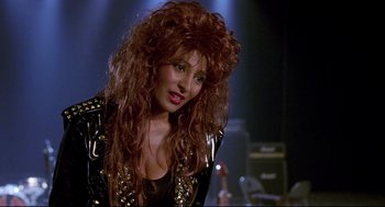 Movie still from “Bill & Ted's Bogus Journey” (1991), directed by Peter Hewitt – A person with long hair; Close Up shot, High angle