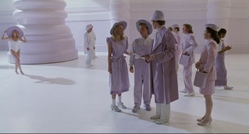 Movie still from “Bill & Ted's Bogus Journey” (1991), directed by Peter Hewitt – A group of people standing around in a room; Wide shot, High angle