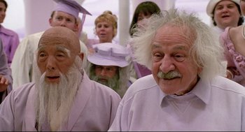 Movie still from “Bill & Ted's Bogus Journey” (1991), directed by Peter Hewitt – A group of people that are standing in a room together; Close Up shot, Low angle