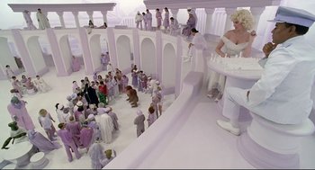 Movie still from “Bill & Ted's Bogus Journey” (1991), directed by Peter Hewitt – A group of people standing around a room; Wide shot, High angle