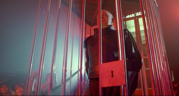 Movie still from “Bill & Ted's Bogus Journey” (1991), directed by Peter Hewitt – Mannequins are behind bars in a jail cell; Medium shot, Low angle