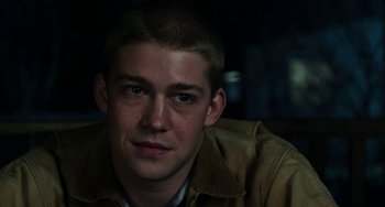 Movie still from “Billy Lynn's Long Halftime Walk” (2016), directed by Ang Lee – A person wearing a brown jacket; Close Up shot, Over the shoulder angle