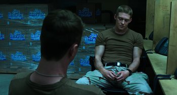 Movie still from “Billy Lynn's Long Halftime Walk” (2016), directed by Ang Lee – Two young men sitting in front of a mirror; Medium shot, Over the shoulder angle