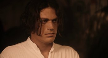 A person wearing a white shirt