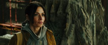 Movie still from “Black Adam” (2022), directed by Jaume Collet-Serra – A person wearing a jacket; Close Up shot, Over the shoulder angle