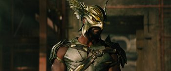 Movie still from “Black Adam” (2022), directed by Jaume Collet-Serra – A person wearing a costume; Close Up shot, Low angle