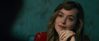 Movie still from “Black Mass” (2015), directed by Scott Cooper – A person with long hair; Close Up shot, Over the shoulder angle