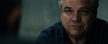 Movie still from “Black Mass” (2015), directed by Scott Cooper – An older man is looking at the camera; Close Up shot, Low angle