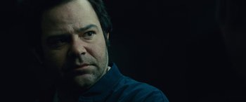 Movie still from “Black Mass” (2015), directed by Scott Cooper – A person wearing a blue shirt; Close Up shot, Low angle