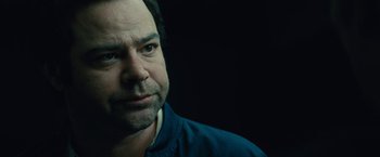 Movie still from “Black Mass” (2015), directed by Scott Cooper – A person wearing a blue shirt; Close Up shot, Over the shoulder angle