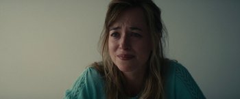 Movie still from “Black Mass” (2015), directed by Scott Cooper – A person with her eyes closed; Close Up shot, High angle