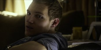 Movie still from “Blair Witch” (2016), directed by Adam Wingard – A man's face in the dark; Close Up shot, Over the shoulder angle