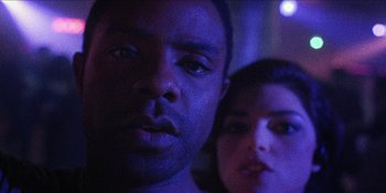 Movie still from “Blair Witch” (2016), directed by Adam Wingard – A man and a woman in a dark room; Close Up shot, Low angle