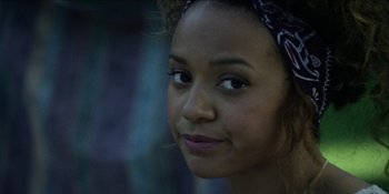 Movie still from “Blair Witch” (2016), directed by Adam Wingard – A young woman's face; Close Up shot, Over the shoulder angle